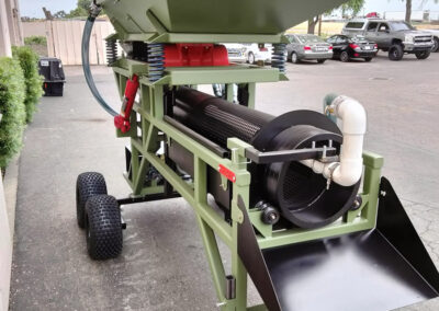 Vibrating Feed Hopper is fully adjustable in angle. The weights for the vibrator as well as the speed of the vibrator are adjustable as well to fine tune material feed rate.